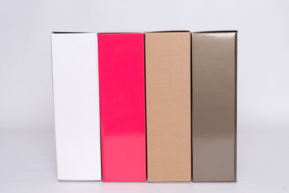 A set of eco-friendly Kraft shipping boxes that are discreet packaging solutions in a variety of colors, including brown, pink, gray, and white. These boxes are made of sturdy, recycled Kraft material, making them an environmentally responsible choice for all your shipping and storage needs. The different colors allow for easy identification and organization of contents, while the plain design ensures they can blend seamlessly with any environment. These boxes are not only durable and practical but also contribute to reducing waste and preserving the planet resources.
