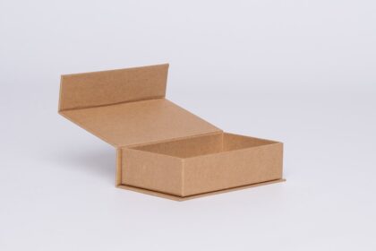 A small, sturdy craftboard box that is a discreet packaging that is perfect for storing and organizing small items such as jewelry, trinkets, ornaments, and other small collectibles. The box is made of high-quality craftboard material, which makes it durable and able to withstand daily wear and tear. The simple design of the box allows it to blend seamlessly with any environment, making it suitable for both personal and professional use. The small size of the box makes it ideal for keeping in drawers, on shelves, or in closets, keeping your items safe and organized. Additionally, the craftboard material is known for its sustainability and eco-friendliness, making it an ideal option for those who wish to reduce waste and preserve the planet's resources.